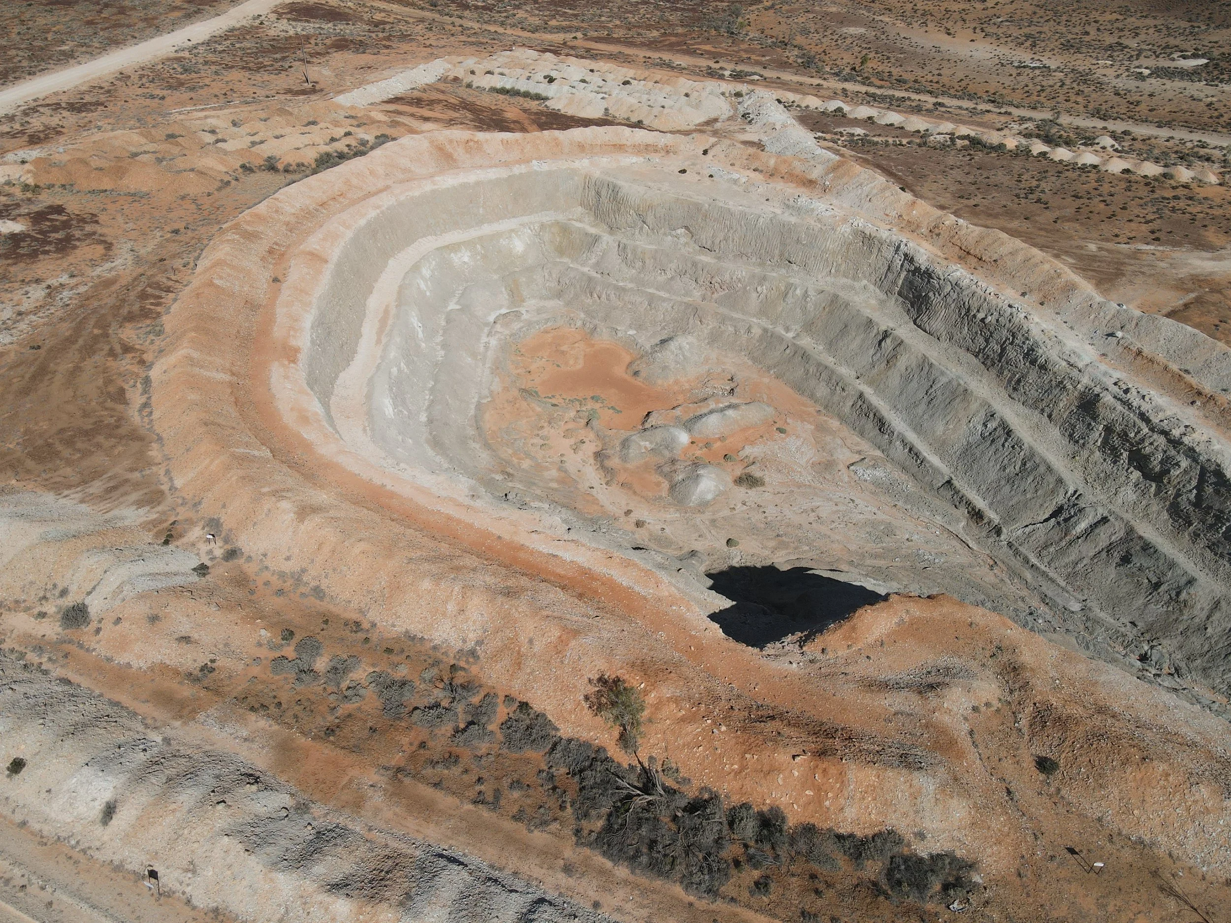 Aerial view of the site and district